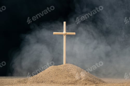 Preview: front view of little grave with cross on the dark background funeral israel death palestine