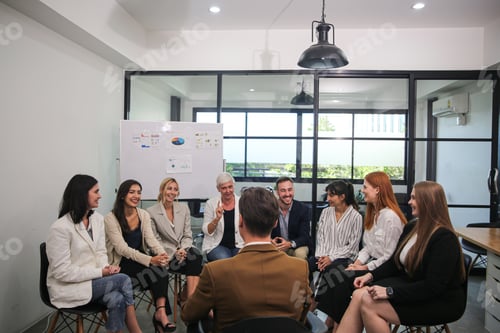 Preview: Young Businessman Speaking in Meeting