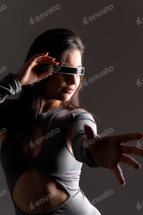 Preview: Futuristic woman experiencing the metaverse world