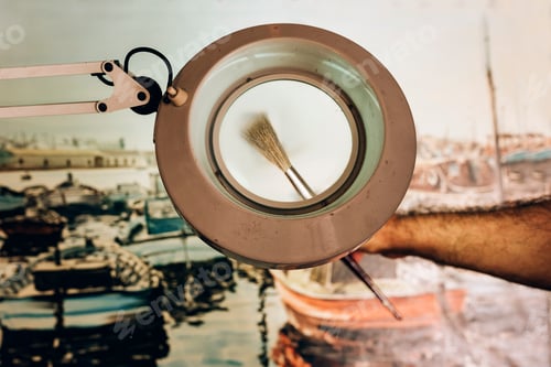 Preview: Close up of man artist painting oils in his studio.