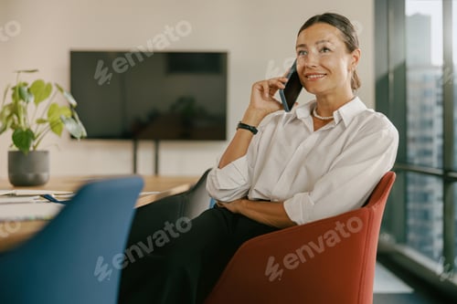 Preview: A Professional Woman is in a Modern Workspace