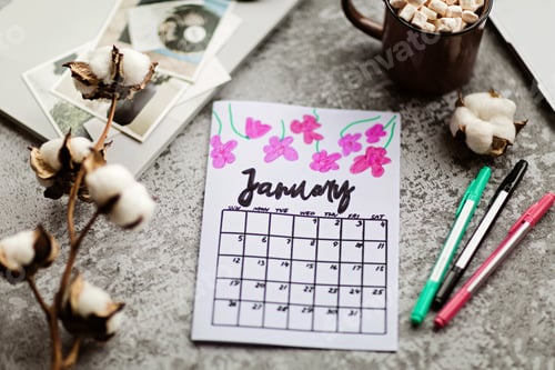 Preview: Calendar flat lay items on desk with laptop cotton flowers magazine lifestyle pen coffee cup mug