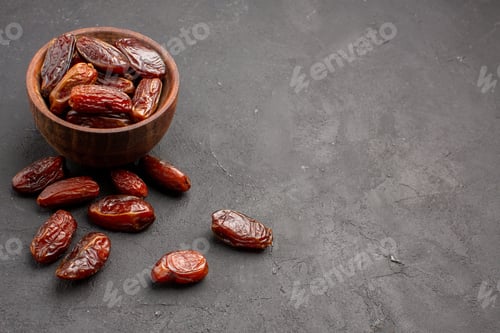 Preview: front view sweet khurma on grey background fruit dry raisin