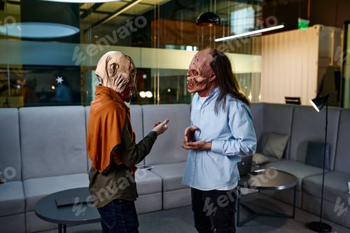 Preview: Zombie coworkers speaking together in office