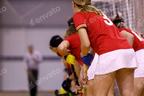 Preview: Young girls on indoor hockey team defending the net during a corner penalty shot