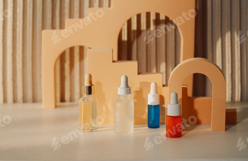 Preview: Glass dropper bottles with pipette on abstract trendy podium for cosmetics products