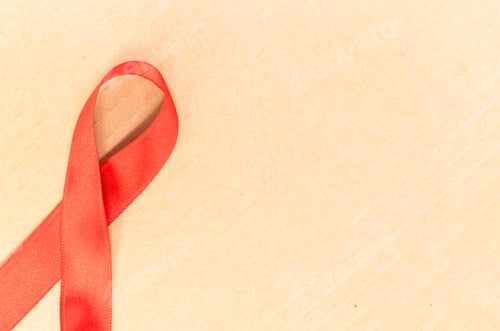 Preview: Top view of a red breast cancer awareness ribbon