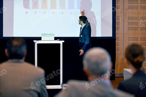 Preview: Presenter Delivering a Presentation to an Audience