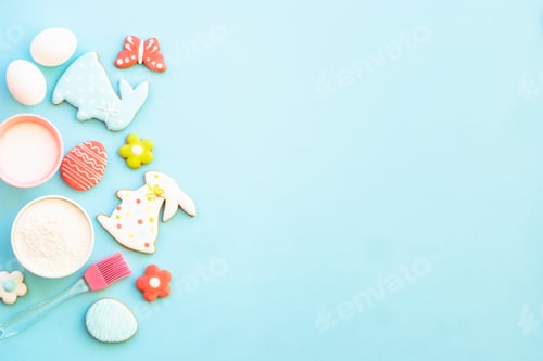 Preview: Easter baking background at blue flat lay.