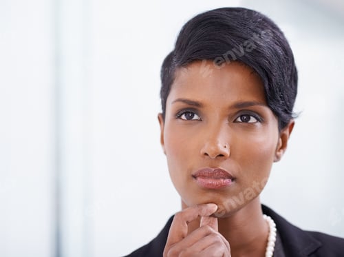 Preview: I wonder...Shot of an attractive young woman businesswoman in her office.