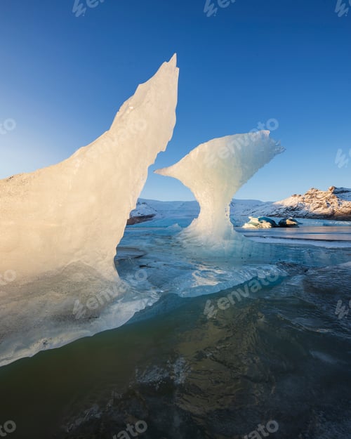 Preview: Calved Ice on Jokulsarlon Black Sand Beach, chunks of glacier ice in the lagoon.