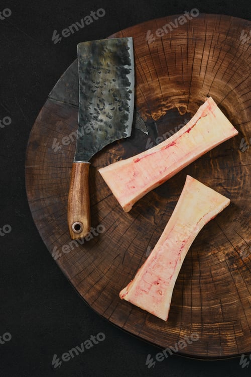 Preview: Top view of large beef bone marrow chopped on half