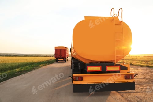 Preview: Modern bright trucks parked on country road
