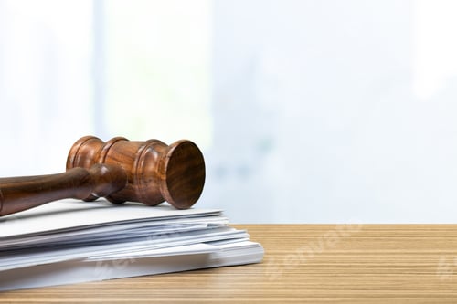 Preview: judge hammer on white paper and table