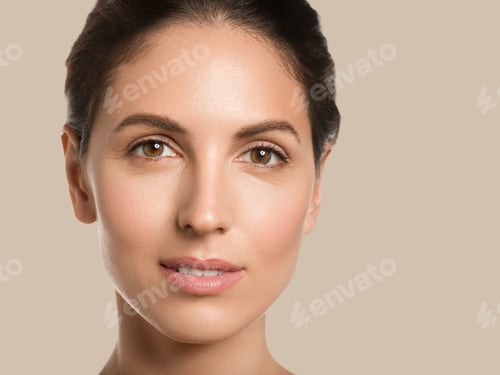 Preview: Woman beauty face healthy skin natural clean fresh face. Close up view. Color background. Brown