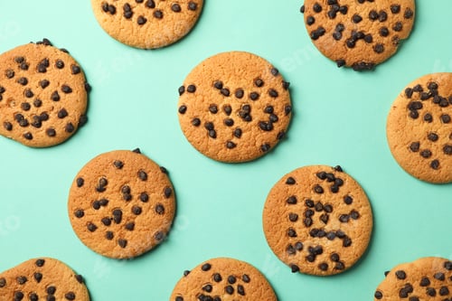 Preview: Flat lay with chocolate chip cookies on mint background