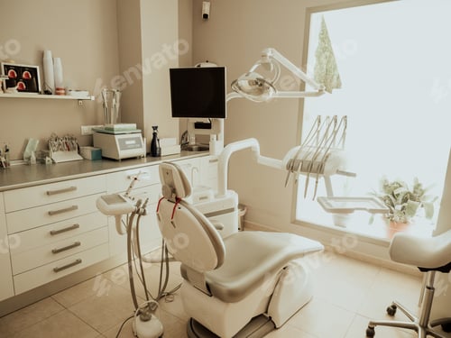 Preview: A dentist's clinic. Working armchair with utensils and tools.