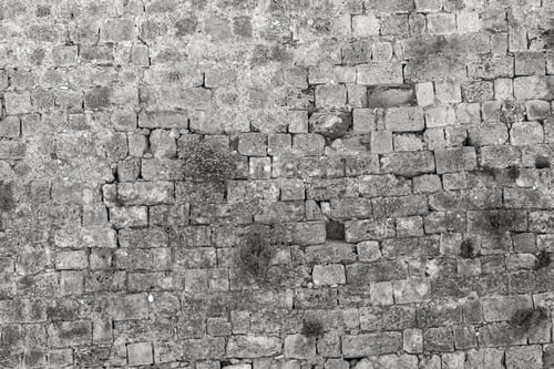 Preview: Old Stone Wall Of Ancient Fortress For A Background With Vintage Texture Of Monochrome Tone