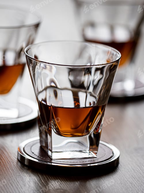 Preview: Three glasses of neat whisky
