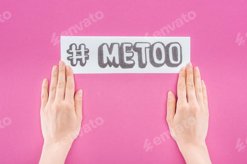 Preview: cropped view of woman holding paper with hashtag me too isolated on pink