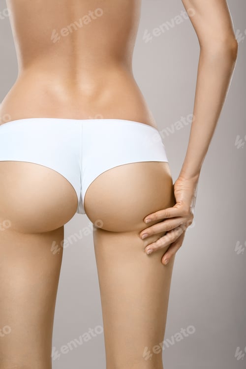 Preview: Unrecognizable young female suffering from joint or muscle pain