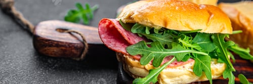 Preview: sandwich bun, sausage, salami, arugula, green lettuce cooking appetizer meal food snack on the table