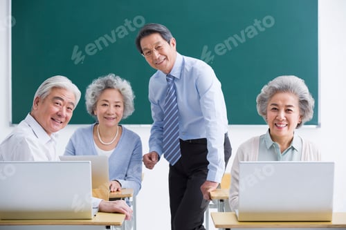 Preview: Senior adults having computer class at school