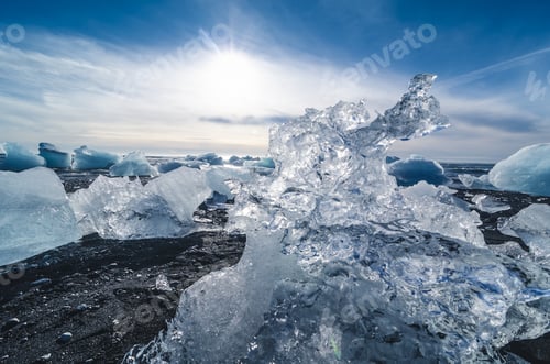 Preview: black beach with pieces of ice