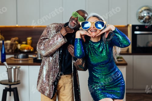 Preview: image of a multiethnic senior couple making party