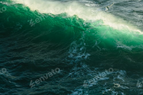 Preview: Detail of crashing waves, surf and crest, windblown mist curling from the white water, and deep