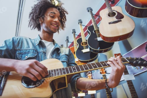 Preview: Man playing guitar