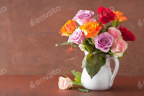 Preview: beautiful colorful rose flowers bouquet in vase