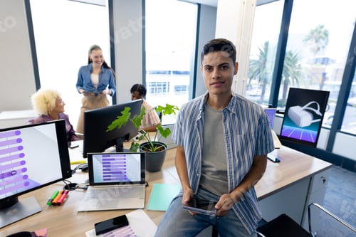 Preview: Colleagues in business collaborating on a startup in a modern office, copy space