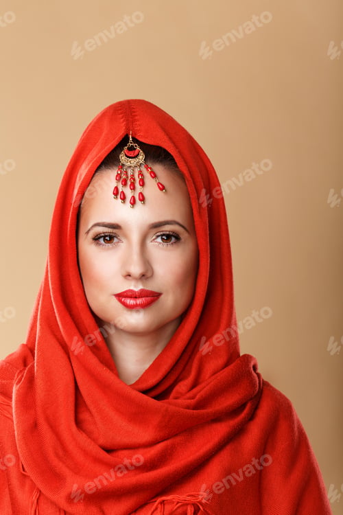 Preview: Portrait Of Girl With Clear Skin. Girl In A Headscarf And With A Jewelry On Her Head. The Concept