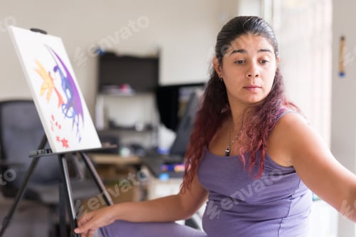 Preview: home relax mental tranquility with art. venezuelan south american woman leisure indoors painting