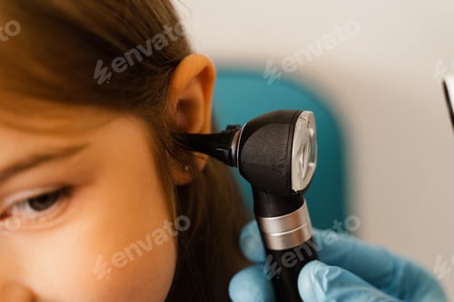 Preview: Close-up otoscopy of child ear during ENT clinic consultation