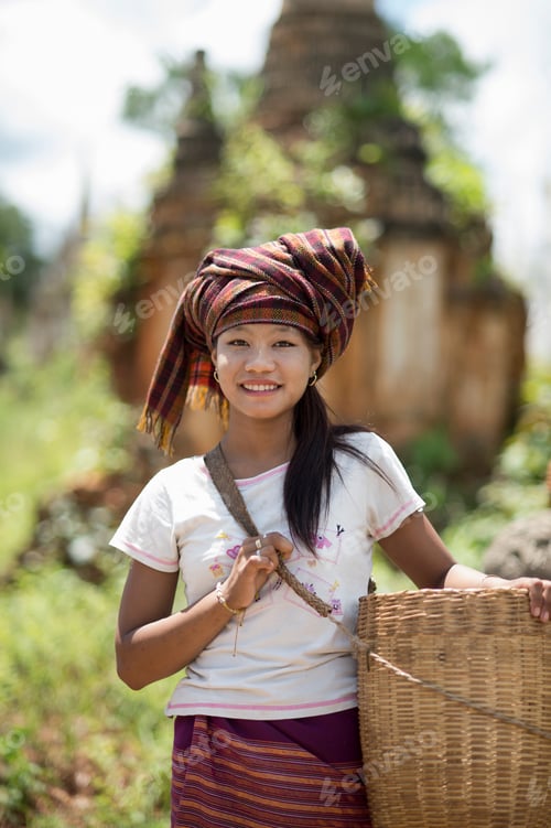 Preview: Teenage girl wearing headscarf carrying basket, Inle lake, Burma