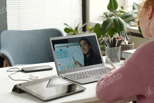 Preview: Laptop screen with young successful teacher of English grammar