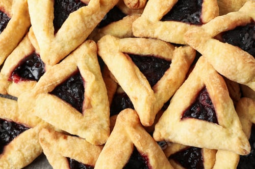 Preview: A mask with traditional cookies for the day of Purim.