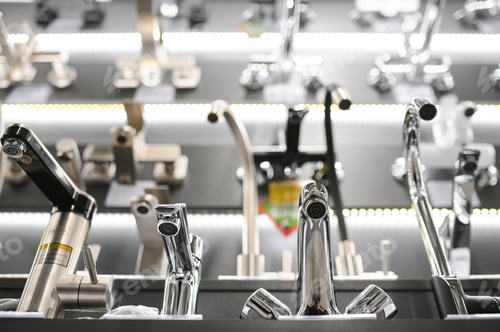 Preview: Water taps of different types and shapes on the counter in the store