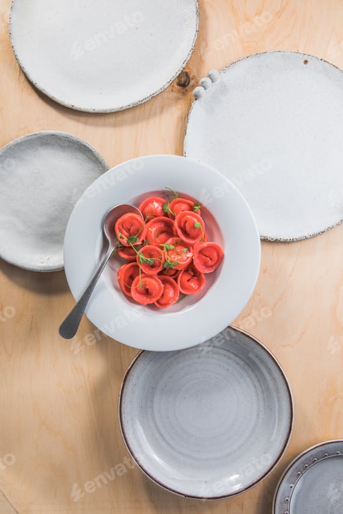 Preview: Homemade tortelli - italian pink pasta,filled with ricotta .
