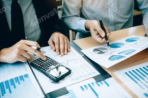 Preview: Manager calculates about the company finances by pressing on the calculator on the table