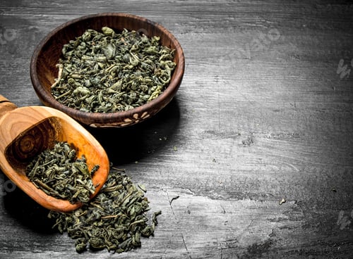 Preview: Green tea in a bowl with a scoop.