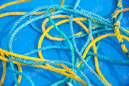 Preview: Background of colorful fishing net pattern with ropes