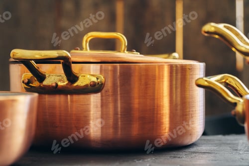 Preview: Clean copper cookware in kitchen close up