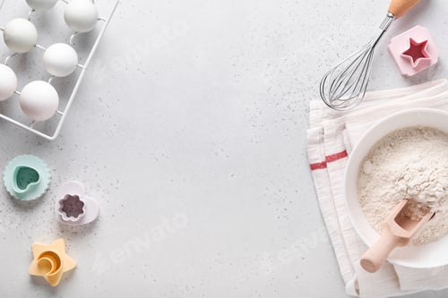 Preview: Ingredients for cooking homemade baking. Baking background with flour, eggs, kitchen tools, utensils