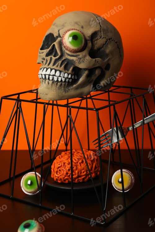 Preview: Table setting for Halloween, scary decorations with a skull