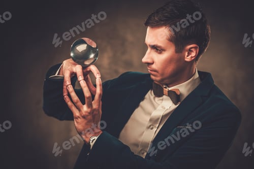 Preview: Young illusionist performing tricks on a stage