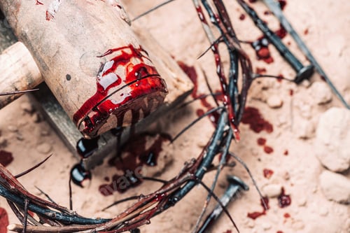 Preview: Good Friday, Passion of Jesus Christ. Crown of thorns, hammer, bloody nails on ground. Christian