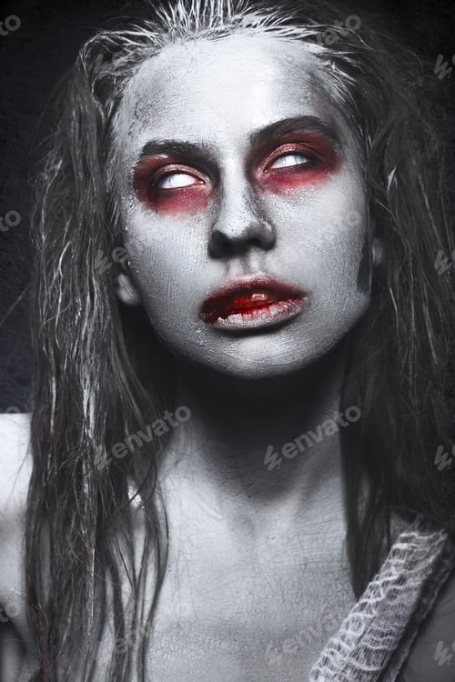 Preview: Girl in form of zombies, Halloween corpse with blood on his lips. Image for a horror film.